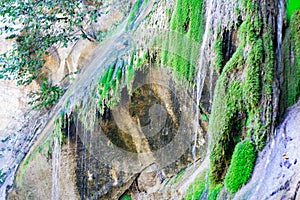 Waterfall from ravine.waterfall from the mountain river. rapid current