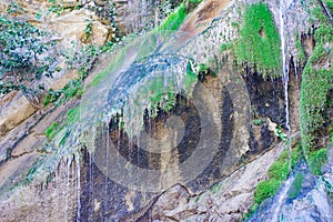 Waterfall from ravine.waterfall from the mountain river. rapid current