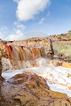 Waterfall in Riotinto mining area, Andalusia, Spain