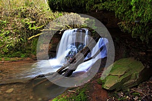 Waterfall on The river Ennig; at the Pwll y Wrach nature reserve