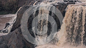 Waterfall in river in Laikipia, Kenya. Aerial drone view right ot left