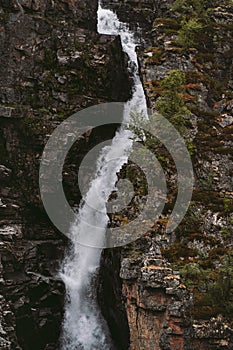 Waterfall and rocks landscape in Norway scandinavian nature Sarafossen in Nordreisa wilderness scenery