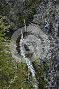 Waterfall between the rocks of the mountain