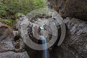 Waterfall in a rocky gorge, Dolomiti Bellunesi National Park