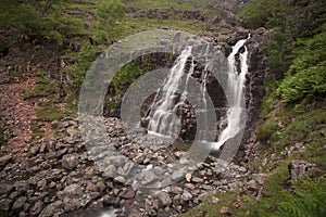 Waterfall in rocky mountains