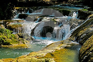 Waterfall run on the rocks in the jungle