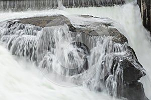 Waterfall rushing over rocks