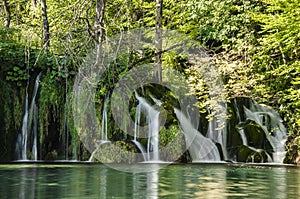 Waterfall`s and water strem at Plitvice lakes park photo