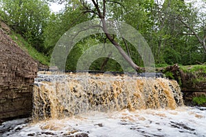 Waterfall on Sablinka River in the Leningrad Region. Sablinsky nature reserve. Russia