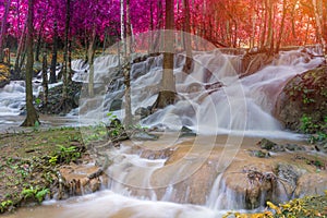 Waterfall scene at Pha Tad Waterfalls in rainforest  at the Khuean Srinagarindra National Park Kanchanaburi