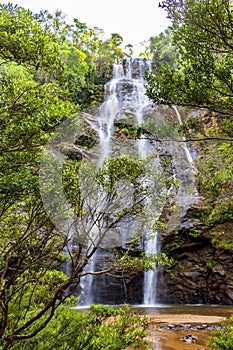 Waterfall seen through the vegetation