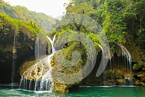 Waterfall in Semuc champey natural pool from the riverside