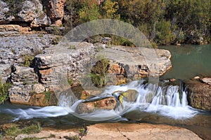 Waterfall in Serrania de Cuenca mountain in Spain photo