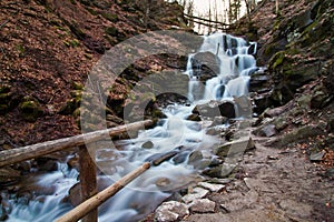 Waterfall Shypit on river Pylypets, Carpathian Mountains in Transcarpathia, mystic evening down Gemba mountain