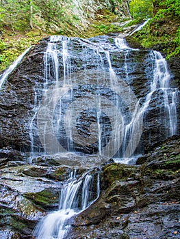 Waterfall with silky, smooth water in the Adirondack Mountains, Upstate New York, USA