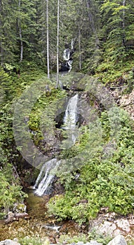 Waterfall and small river in Rhodopes Mountains