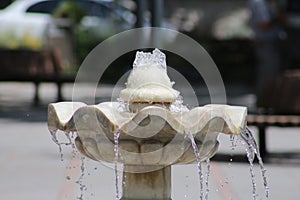 A waterfall and a stone