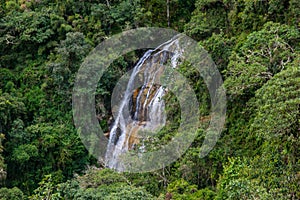 Waterfall on the stone paved path Inca Trail to Machu Picchu.