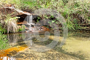 Waterfall and swimming hole in bush Australia