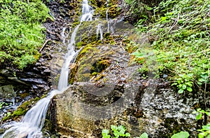 Waterfall in the Swiss Alps near Scuol