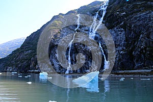 Waterfall in the Tracy Arm fjord in the Boundary Ranges of Alaska, United States