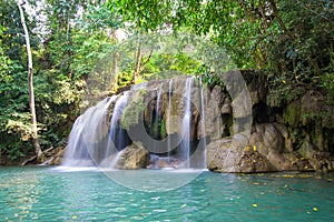 Waterfall in tripical forest of thailand photo