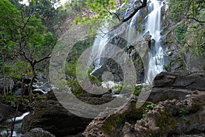 Waterfall in a tropical forest. Waterfalls in Kamphaeng Phet Province  Thailand. Landscape of the waterfall. Streams and rocks in