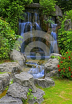 Waterfall in tropical zen garden