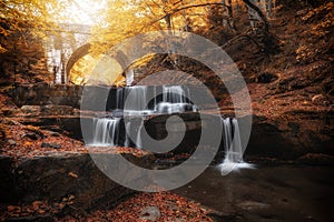 Waterfall under stone bridge in Rhodope mountain near Sitovo village, Plovdiv region, Bulgaria, Euro