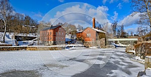 Waterfall in Vanhankaupunginkoski and old power station, Helsinki