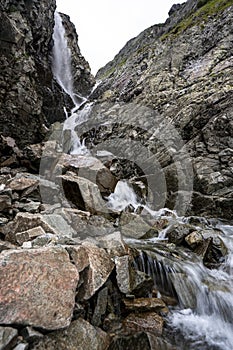 A waterfall in the Velka Zmarzla Valley. Tatra National Park, Slovakia