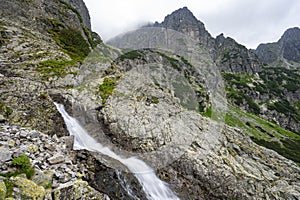 A waterfall in the Velka Zmarzla Valley. Tatra National Park, Slovakia