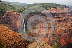 Waterfall in Waimea Canyon on Kauai Island, Hawaii