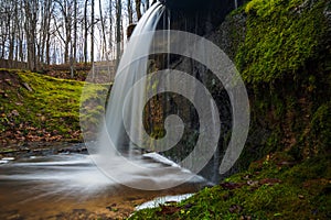 Waterfall. A wall covered with moss