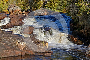 The waterfalls called Chutes Croches at sunset colors