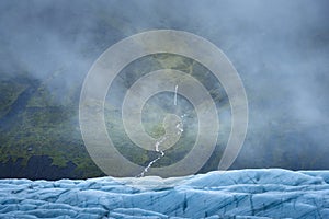 Waterfalls, fog and glacier