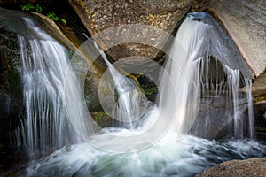 Waterfalls in granite rocks in Sierra de Gredos  Spain. Concept of nature and purity
