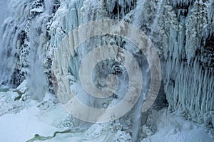 Waterfalls in Letchworth State Park view during winter. USA