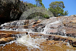 Waterfalls in middle a rocks, in Tabuleiro region, Minas Gerais photo