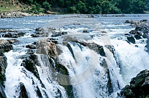 Waterfalls near the city Jabalpur, India. Beautiful scenery on a river with waterfalls.