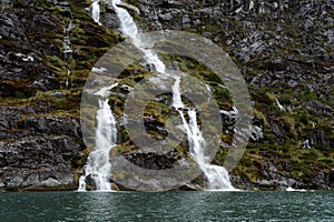 Waterfalls Nena glacier on the archipelago of Tierra del Fuego.