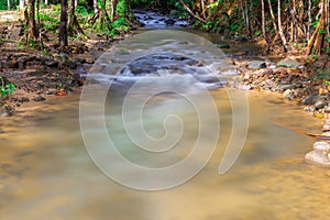 waterfalls in Phangna province in Thailand. Silky smooth running water nice brown rocks