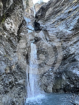 Waterfalls on the SchrÃ¤abach creek in the Calfeisental alpine valley and in the UNESCO World Heritage Tectonic Arena Sardona