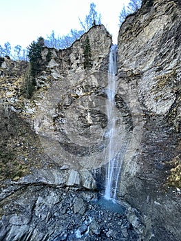 Waterfalls on the SchrÃ¤abach creek in the Calfeisental alpine valley and in the UNESCO World Heritage Tectonic Arena Sardona