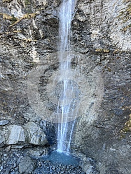 Waterfalls on the SchrÃ¤abach creek in the Calfeisental alpine valley and in the UNESCO World Heritage Tectonic Arena Sardona