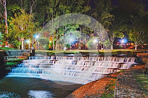Waterfalls in sequence of steps on a long exposure photo photo