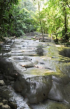 Waterfalls of siete altares on the forest at Livingston photo