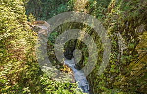 Waterfalls Stanghe Gilfenklamm localed near Racines, Bolzano in South Tyrol, Italy. Wooden bridges and runways lead through the