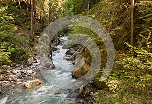 Waterfalls Stanghe Gilfenklamm localed near Racines, Bolzano in South Tyrol, Italy. Wooden bridges and runways lead through the