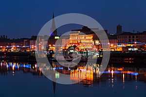 Waterford, Ireland. Panoramic view of a cityscape at night